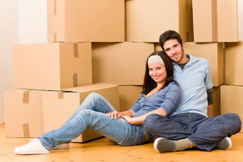 Preparation for a Highbury move with furniture, boxes, and truck loading