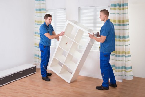 Local movers loading furniture and boxes for a Highbury relocation
