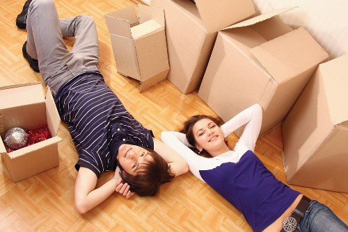 Packed boxes and furniture prepared for transport in Highbury