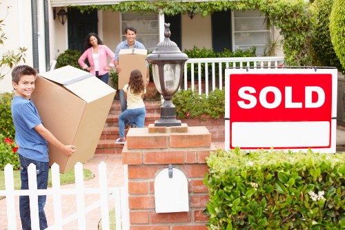 Loading furniture into a local moving van for a Highbury relocation